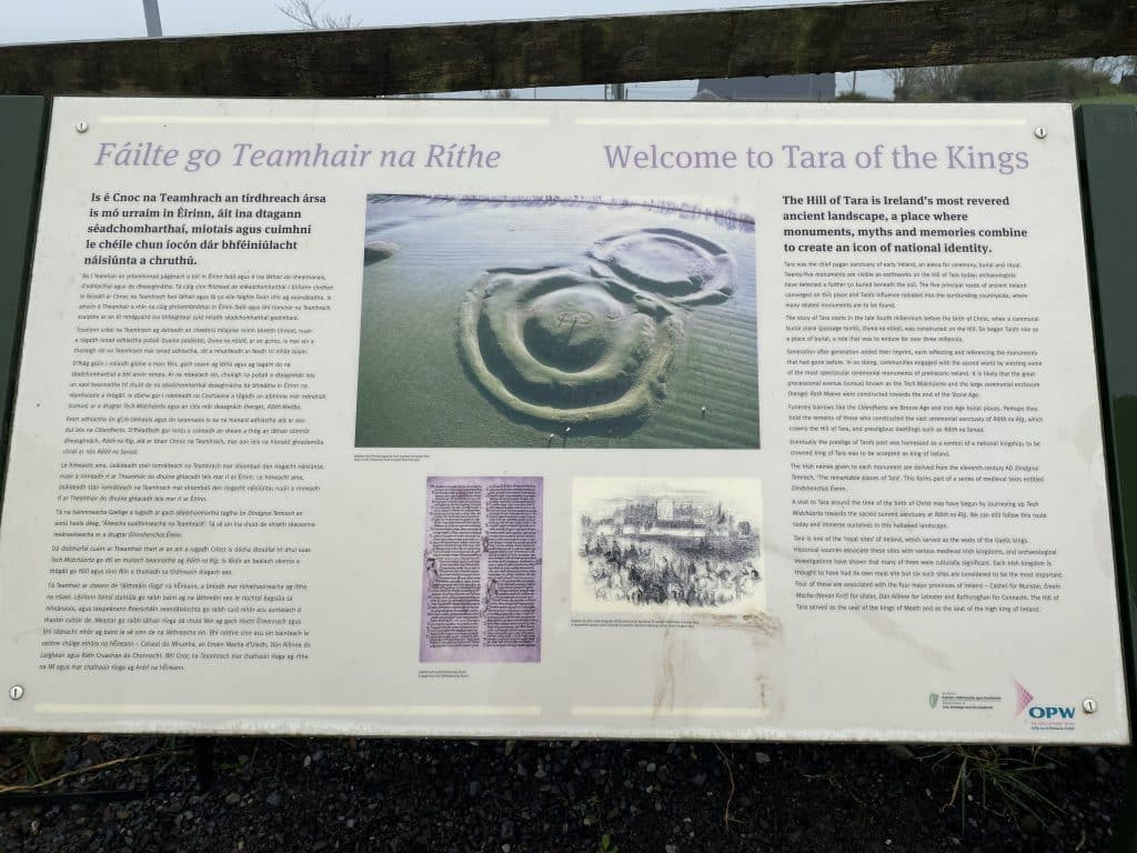Photograph of one of the main information signs at Hill of Tara showing an aerial view of the site and summarsing its history and mythology