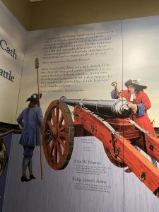 Exhibit at the Battle of the Boyne Visitor Centre showing soldiers loading a cannon
