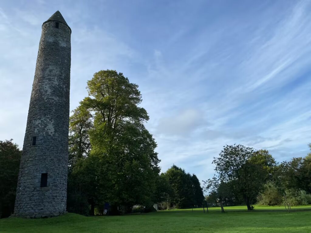 Photograph of Antrim Round Tower with blue sky