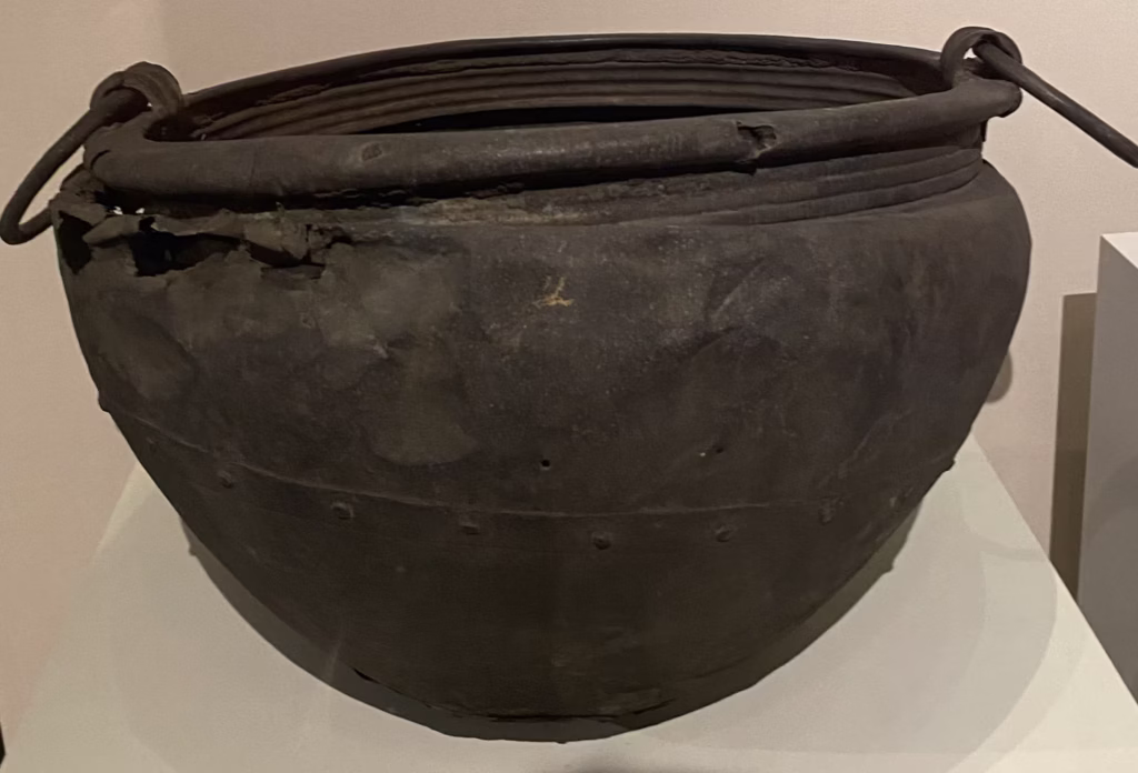 Iron Cauldron discovered in County Antrim, Northern Ireland, on display in the Ulster Museum in Belfast. Photograph taken by Daniel Kirkpatrick.