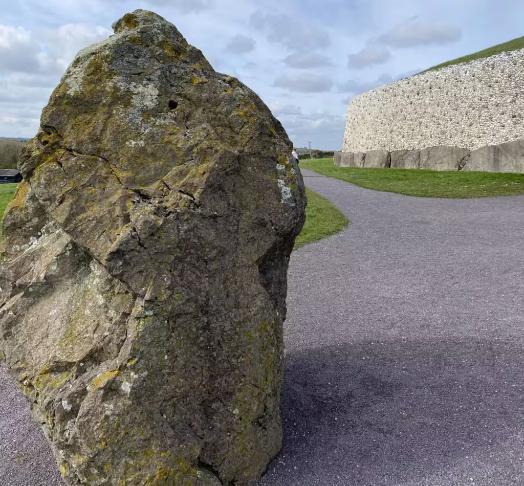 Photograph of one of the standing stones in front of the Newgrange Passage Tomb in Ireland. Photograph taken by Daniel Kirkpatrick